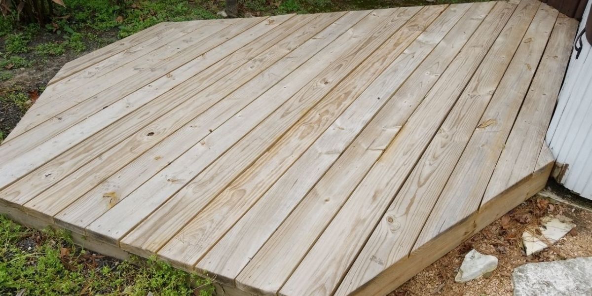 Wood deck installation in Kingwood TX by Astro Outdoor Designs