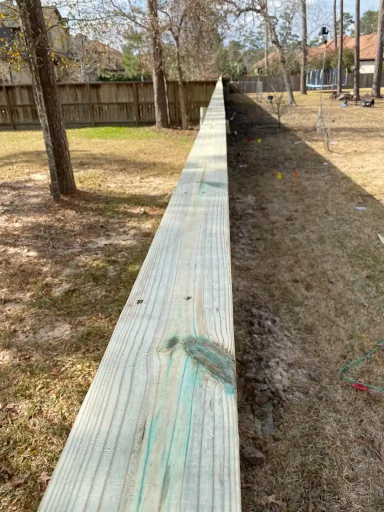 Straight line fence installation by Astro Outdoor Designs - get an AI fence quote online