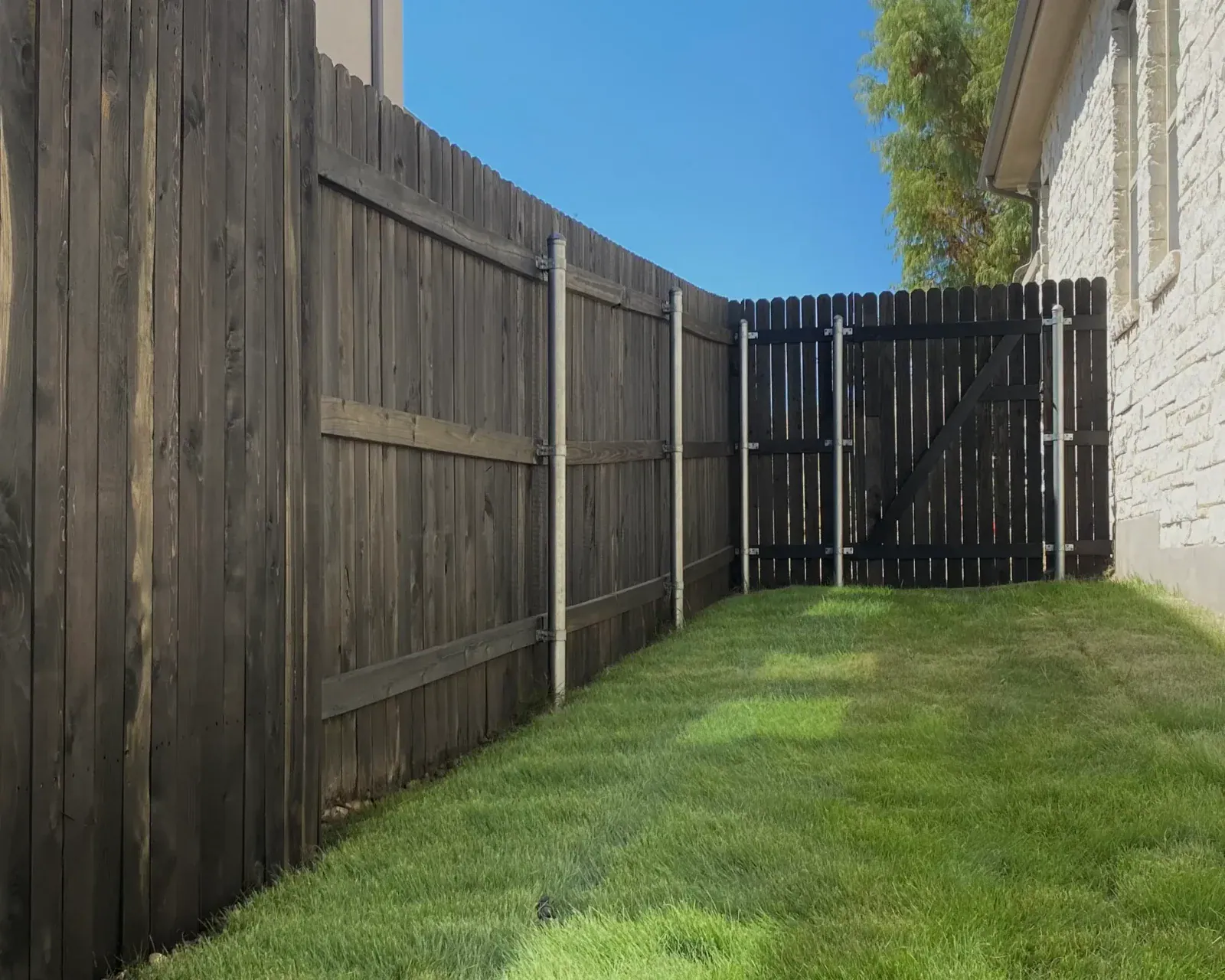 Black Walnut Wood Defender fence stain – fence staining in The Woodlands TX by Astro Outdoor Designs