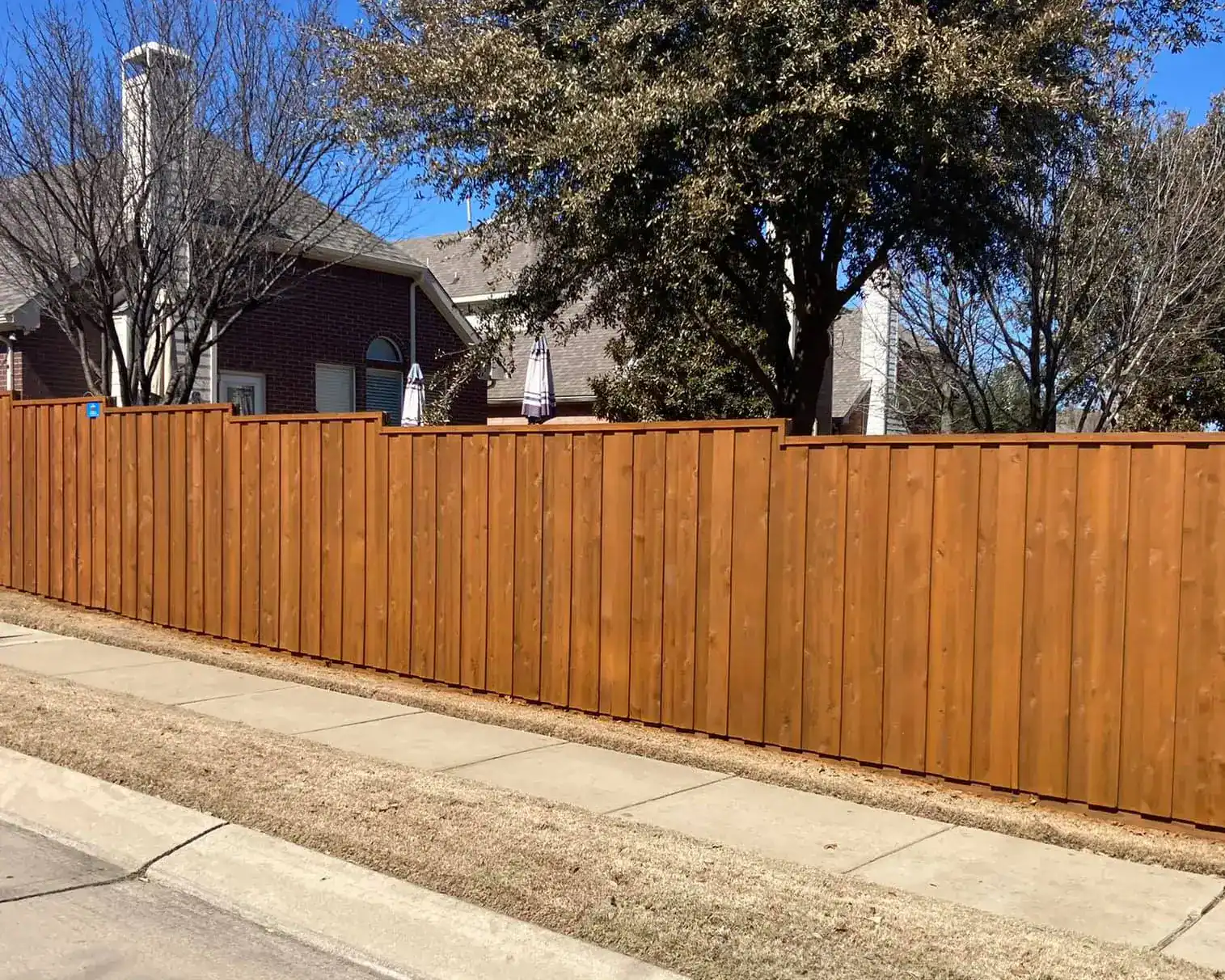 Rustic Oak Wood Defender fence stain – fence staining in The Woodlands TX by Astro Outdoor Designs